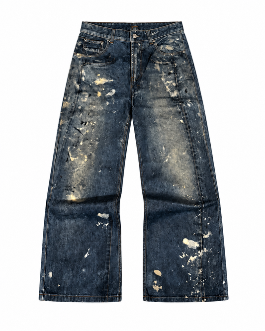 Jeans Forgiveness Deslavado, mezclilla azul con desgaste y salpicaduras