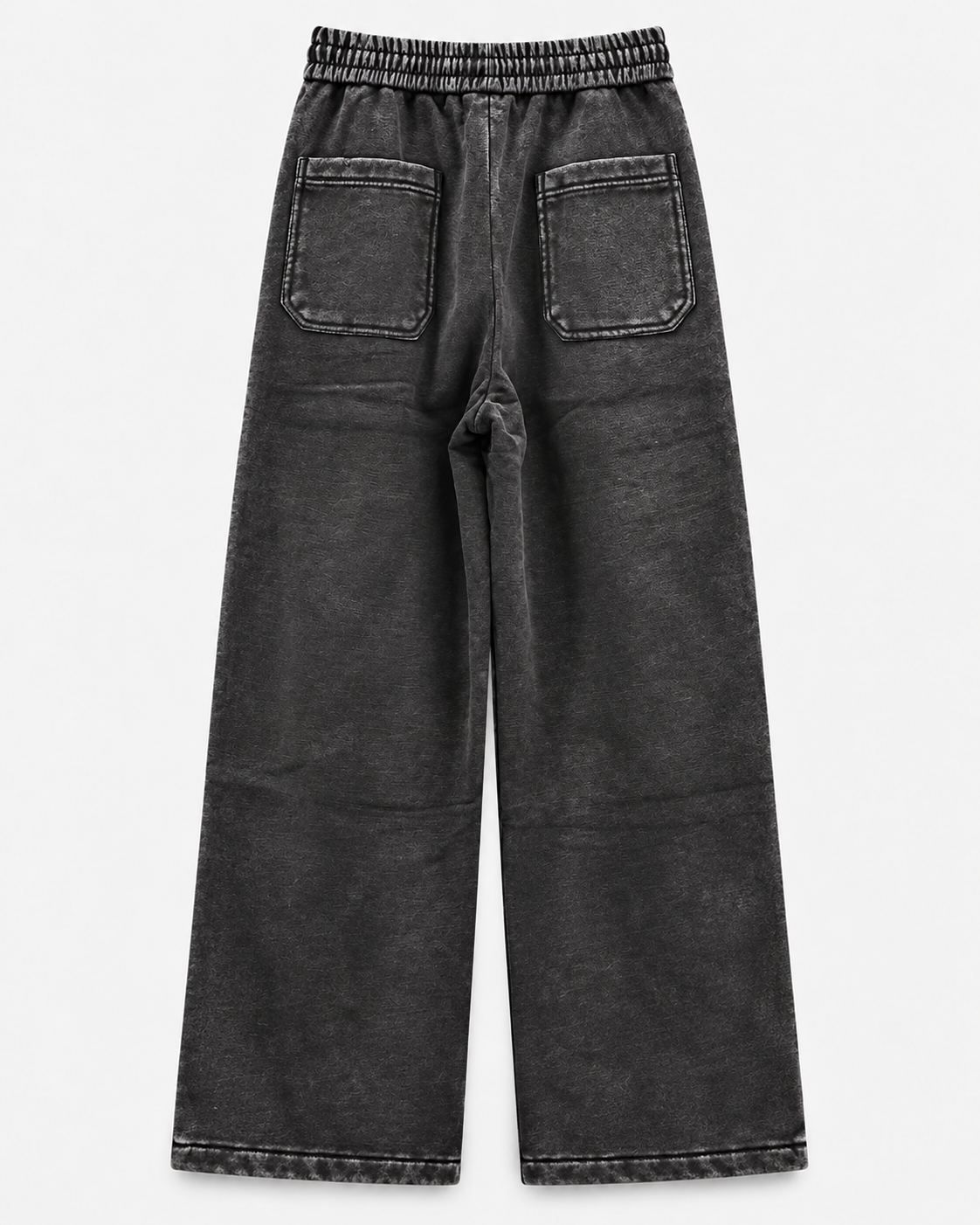 Pants Negro Acid Wash - vista trasera sobre fondo neutro