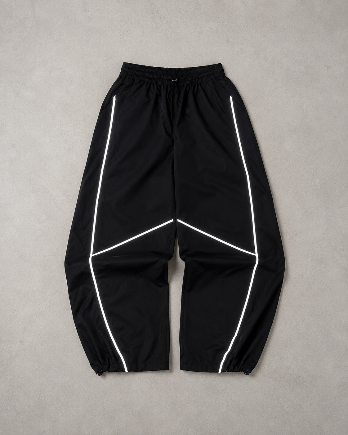 Pants Baggy Comfort ECO negro corte holgado con detalles reflectantes, vista frontal
